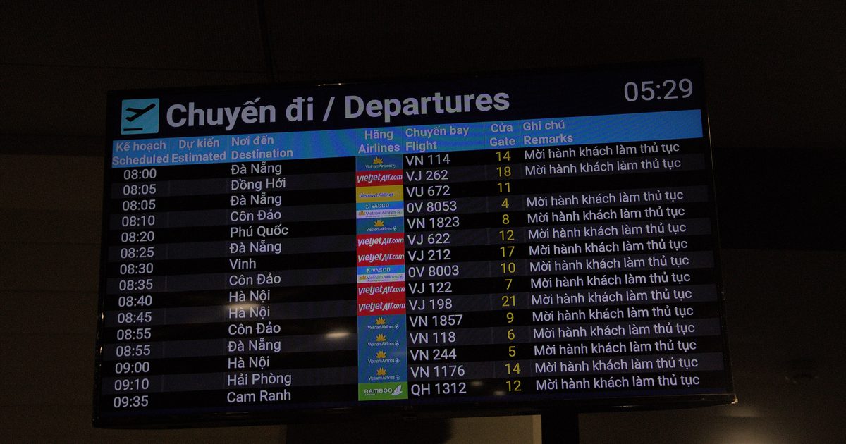 Airport departures board listing upcoming flights