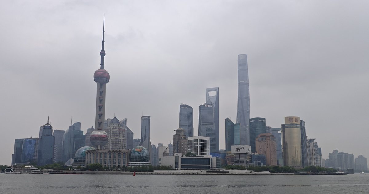 The Pudong skyline with the Oriental Pearl Tower and Shanghai Tower seen from the Bund